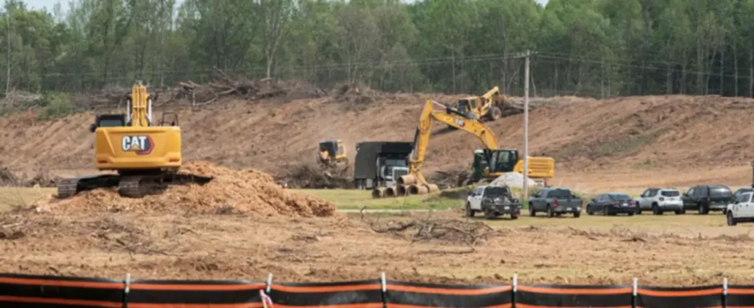 Excavators working at Nscale’s Monarch Compute Campus construction site in West Virginia